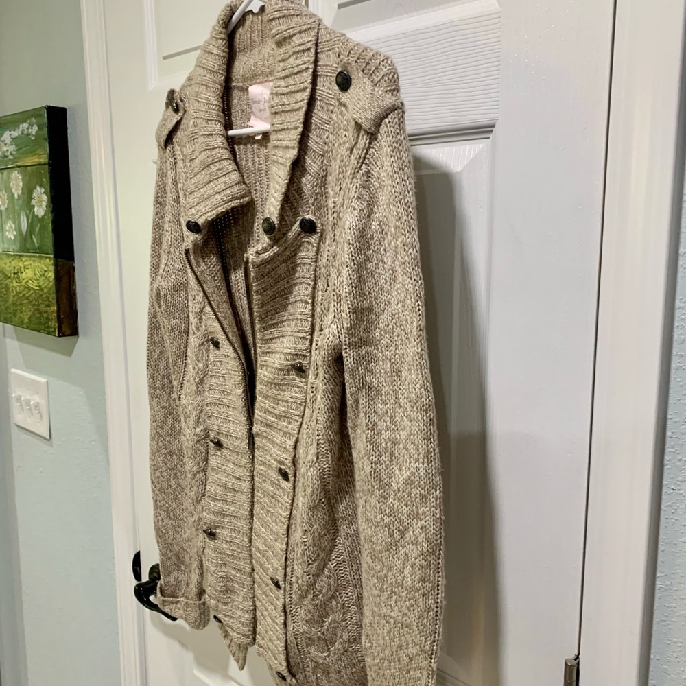 By Romeo and Juliet couture New York, soft styled and luxurious knit cardigan.